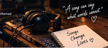 Studio headphones and songwriting notebook